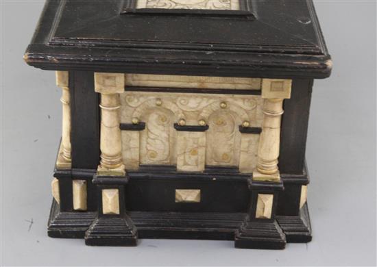 A 17th century Malines alabaster mounted ebonised casket, height 8.25in. with handle up 13.75in.